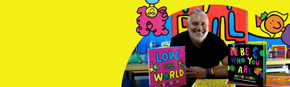 Preschool child & teacher playing at table